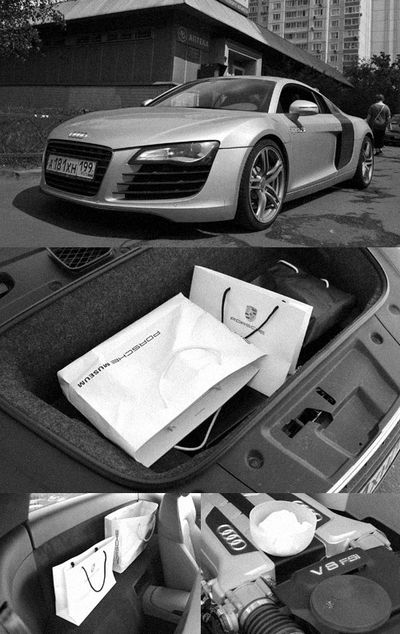 К вопросу о практичности. Прогулявшись по бутикам, я нёс в руках десяток пакетов — и все они уместились в R8! Передний багажник — что у Porsche 911, стандартного суперкаровского размера. А позади сидений есть полка, на которую можно пристроить пару небольших чемоданов. И ещё о практичности: после покатушек на автодроме моторная плита раскалилась так, что разогревали на ней еду быстрее, чем в любой микроволновке. В следующий раз запасёмся шашлыком