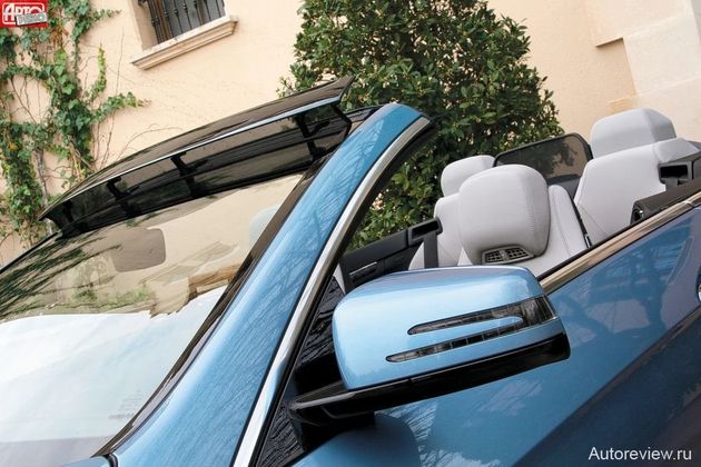 Система AirCap — это выдвигаемый электромоторчиком из рамки лобового стекла дефлектор и экран за салоном (также с электроприводом)