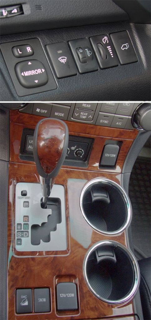 На блоке слева от руля (верхнее фото) есть кнопки включения электрообогрева лобового стекла в зоне покоя стеклоочистителей и электропривода пятой двери. А на широком центральном тоннеле — четыре подстаканника и две 12-вольтовые розетки. Позади селектора «автомата» расположены клавиши включения зимнего режима и системы помощи спуска с горы